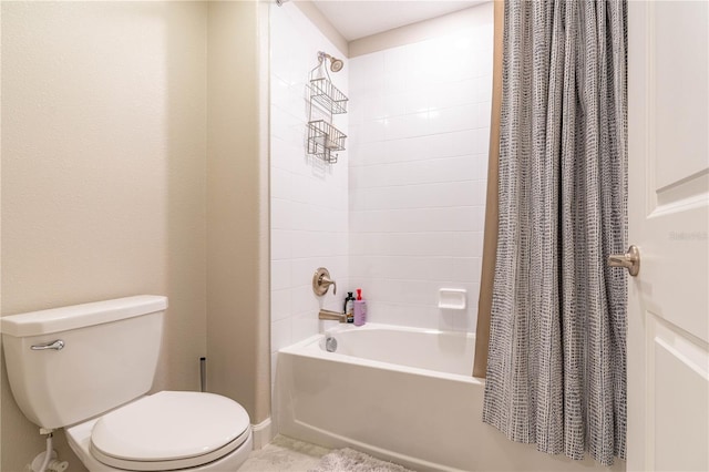 bathroom with toilet and shower / bathtub combination with curtain