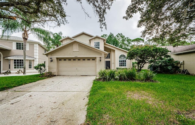 front facade featuring a front lawn and a garage