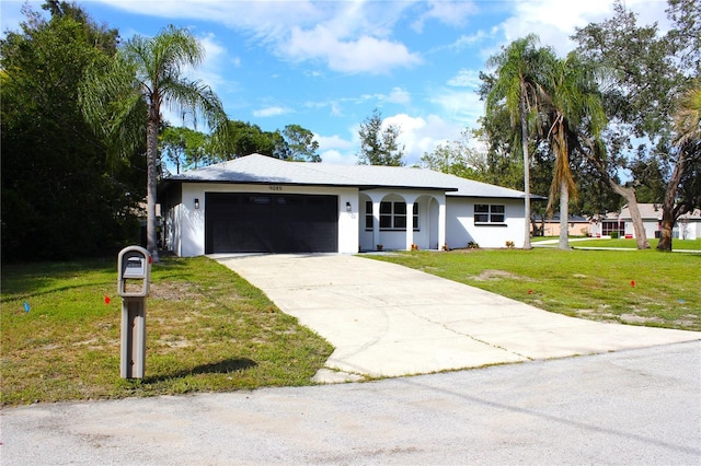 9085 Dorsey St, Spring Hill, FL 34608 - ranch-style home featuring a garage, a front lawn, concrete driveway, and stucco siding