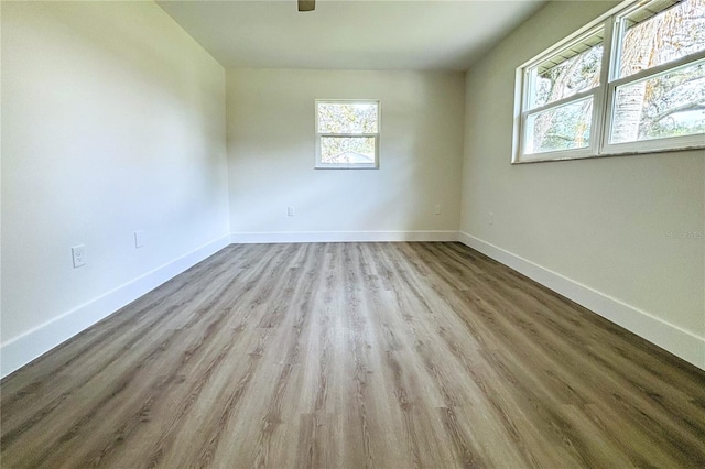 spare room featuring light wood-type flooring