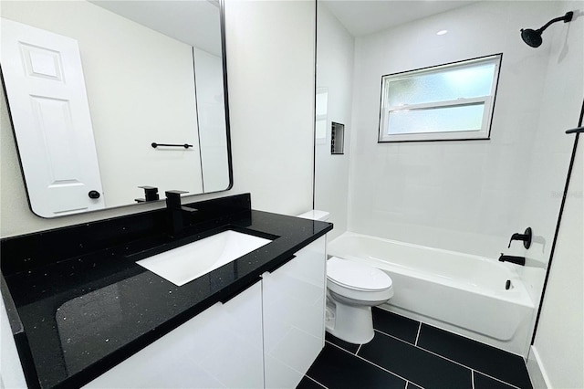 9085 Dorsey St, Spring Hill, FL 34608 - full bath featuring toilet, shower / washtub combination, vanity, and tile patterned floors