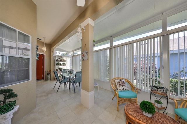 sunroom / solarium with lofted ceiling