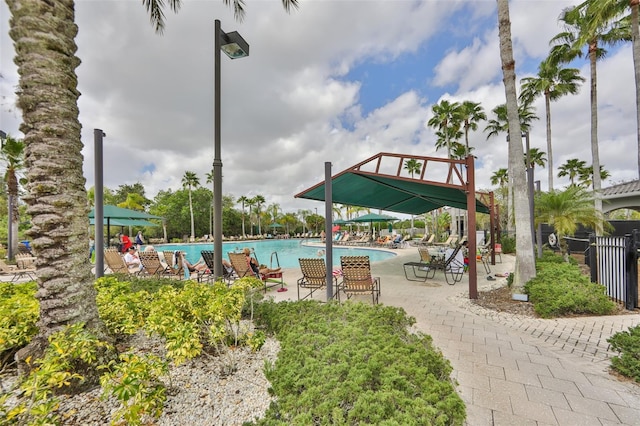 view of swimming pool with a gazebo and a patio