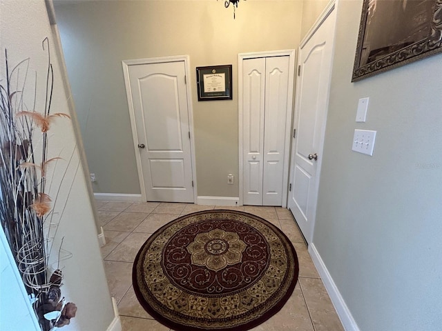 foyer featuring light tile patterned floors