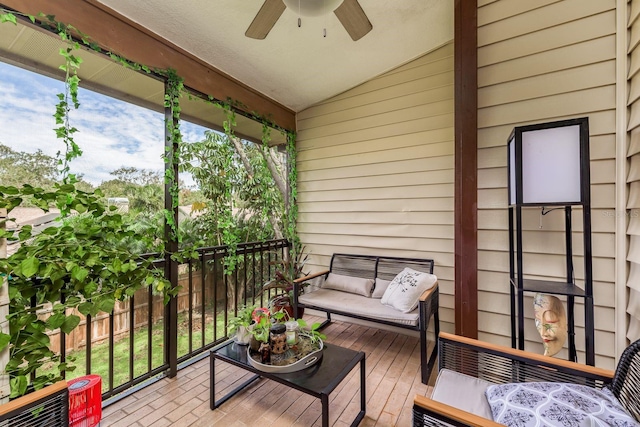 balcony featuring ceiling fan