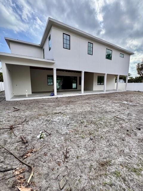 back of house featuring a patio