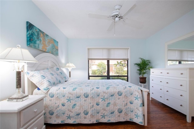 bedroom featuring ceiling fan and dark hardwood / wood-style flooring