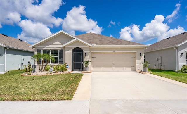 ranch-style house featuring a front lawn and a garage