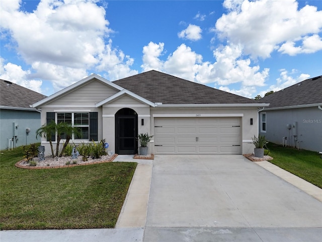 1523 Glen Grove Loop, Wesley Chapel, FL 33543 - ranch-style home featuring an attached garage, a front lawn, concrete driveway, stucco siding, and roof with shingles