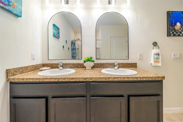 1523 Glen Grove Loop, Wesley Chapel, FL 33543 - full bathroom with double vanity and tile patterned flooring