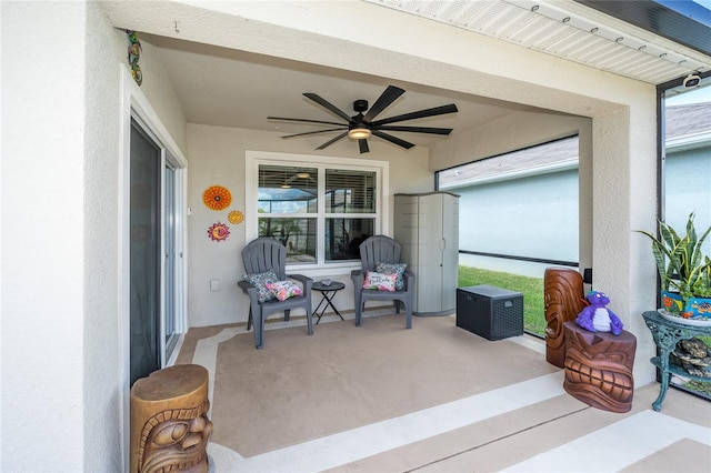 view of patio / terrace featuring ceiling fan