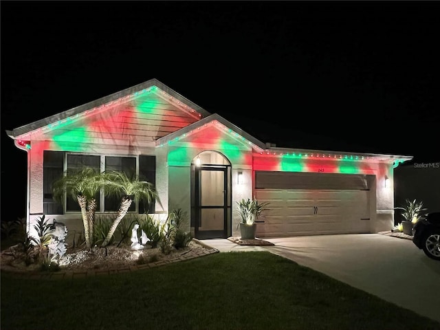 1523 Glen Grove Loop, Wesley Chapel, FL 33543 - view of front facade with an attached garage and driveway