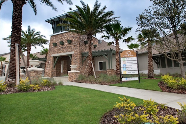 view of front of home with a front lawn