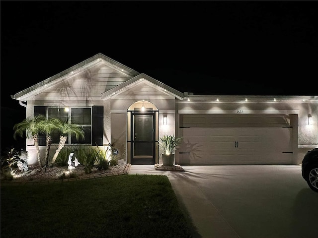 view of front of home with a garage