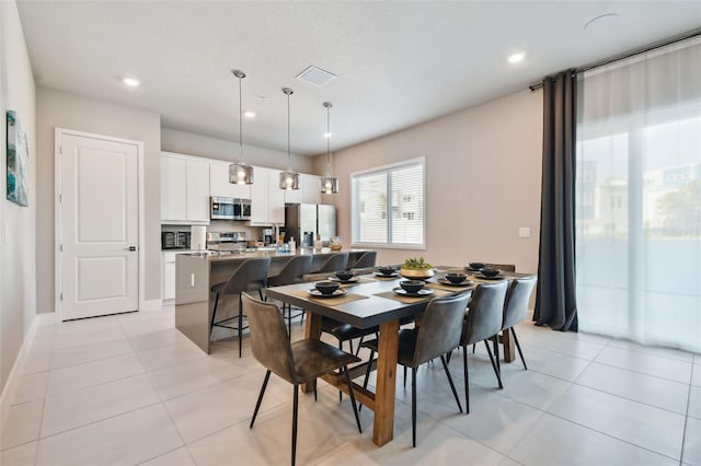 dining room with light tile patterned floors