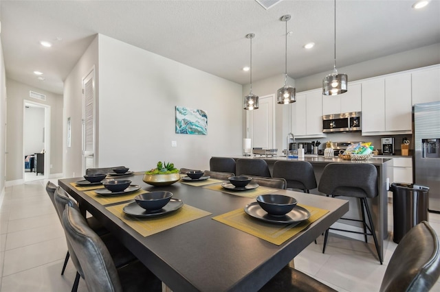 view of tiled dining space