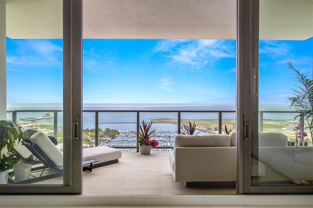 balcony featuring a water view