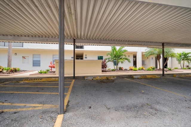 view of parking with a carport