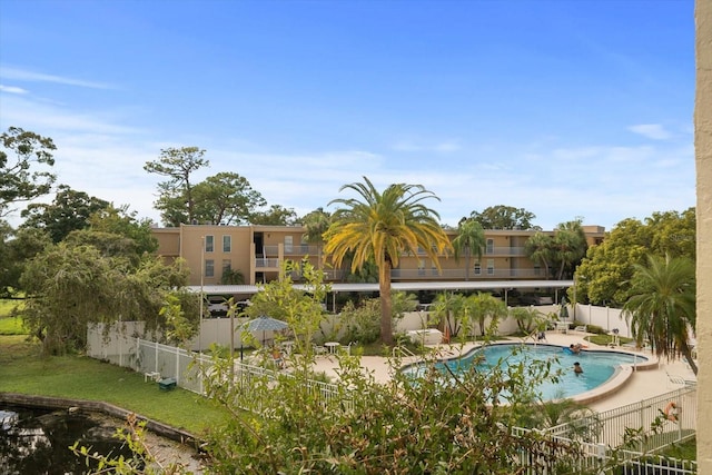 view of swimming pool featuring a patio area