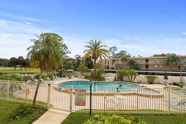 view of pool featuring a patio area