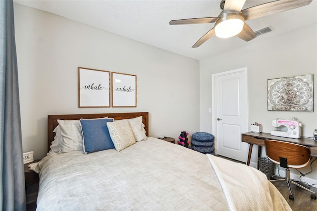 bedroom featuring ceiling fan and hardwood / wood-style floors