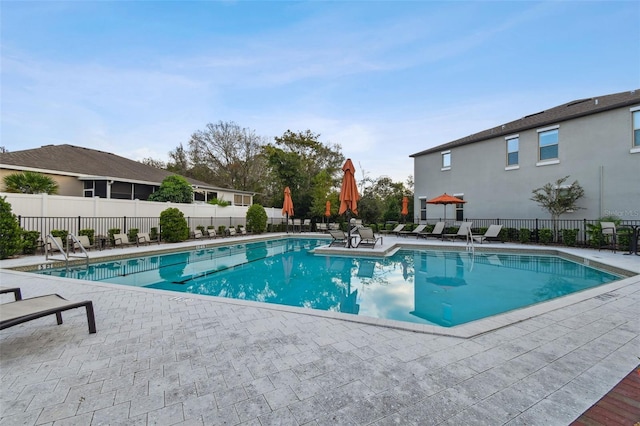 view of pool featuring a patio