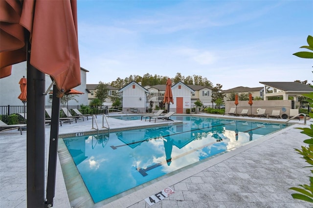 view of pool featuring a patio area