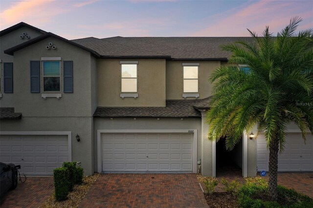 view of front of property featuring a garage