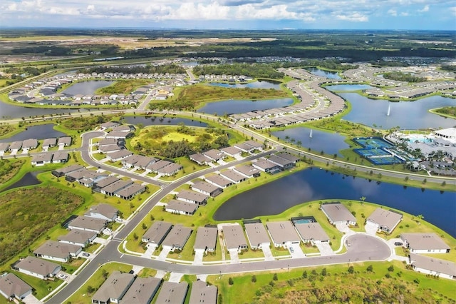 drone / aerial view with a water view