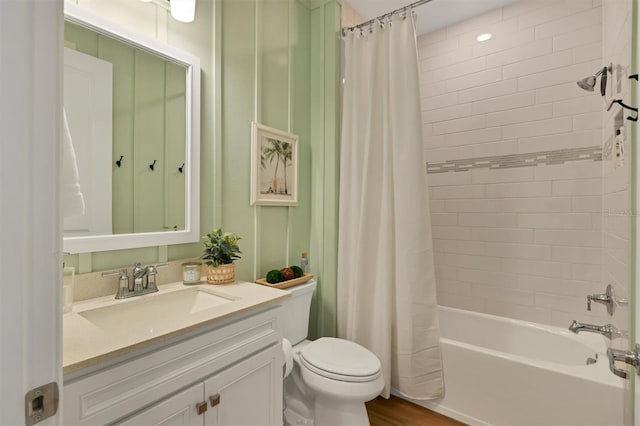 full bathroom featuring vanity, toilet, shower / tub combo with curtain, and wood-type flooring