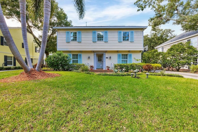 view of front facade featuring a front yard