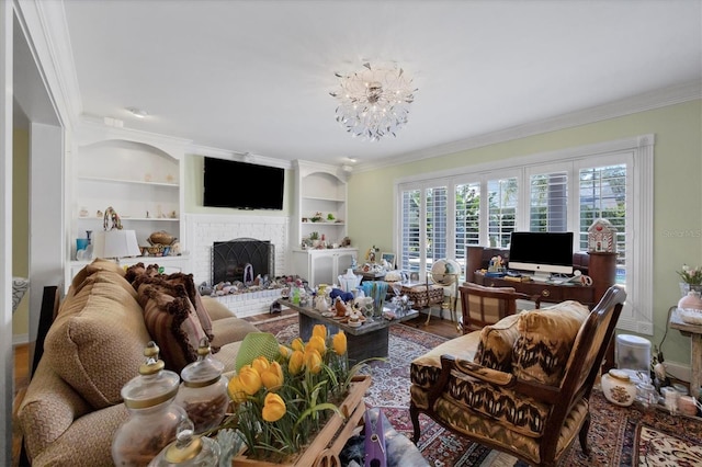 living room with crown molding, a fireplace, and built in features