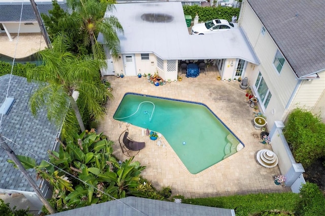 outdoor pool with a patio