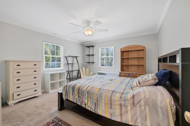 bedroom featuring light carpet, ceiling fan, ornamental molding, and multiple windows