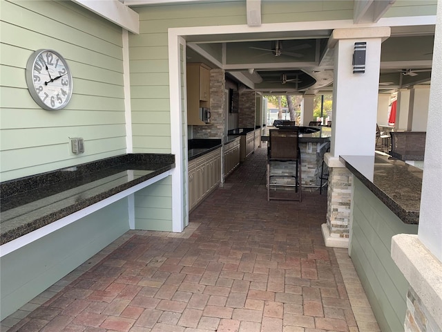 view of patio featuring an outdoor kitchen