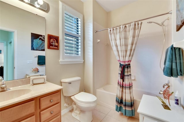 bathroom with toilet, tile patterned flooring, vanity, and shower / bath combo