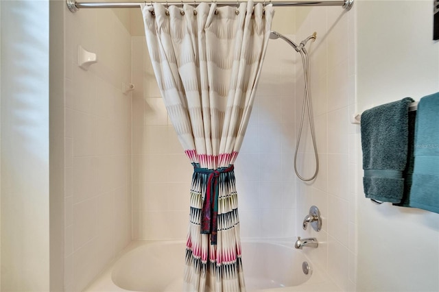 bathroom with shower / bath combo