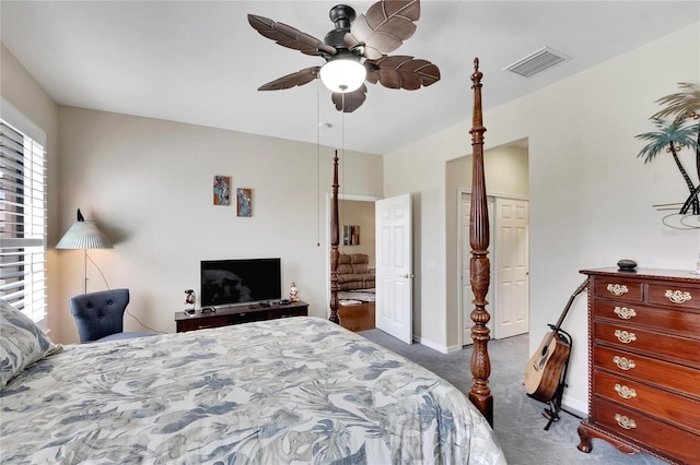 carpeted bedroom with baseboards, ceiling fan, and visible vents