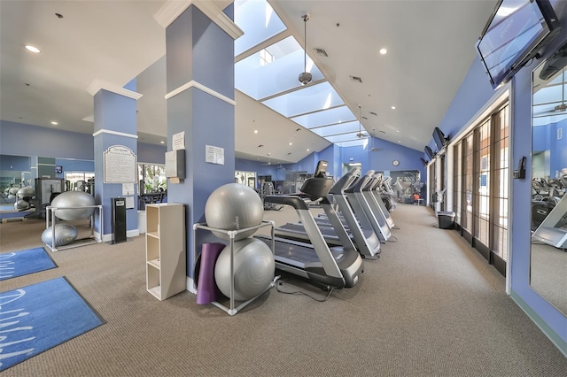 workout area featuring baseboards, high vaulted ceiling, visible vents, and recessed lighting