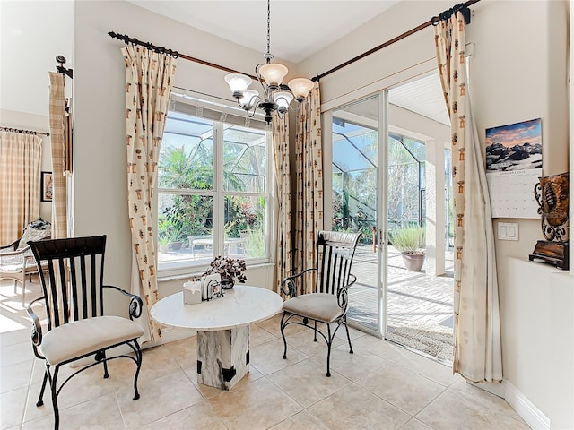 sitting room featuring light tile patterned floors and a notable chandelier