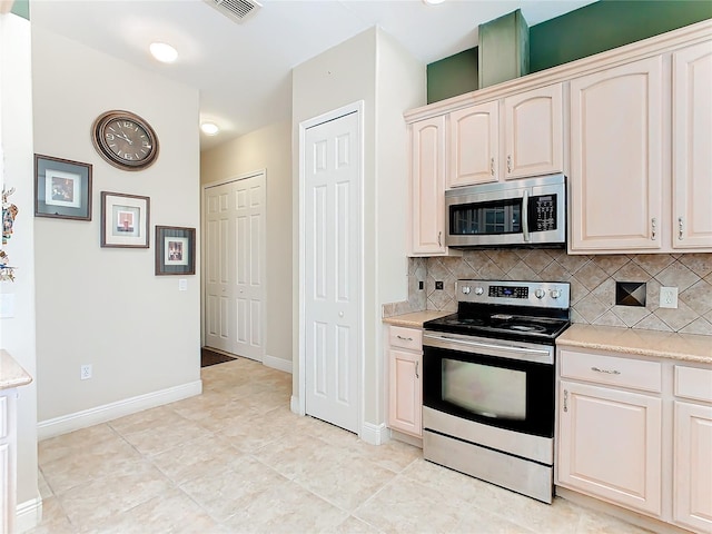 kitchen featuring decorative backsplash and stainless steel appliances