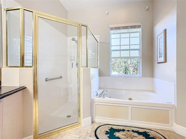 bathroom featuring separate shower and tub and tile patterned floors