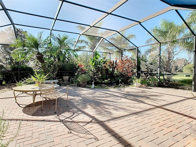 view of patio / terrace with a lanai