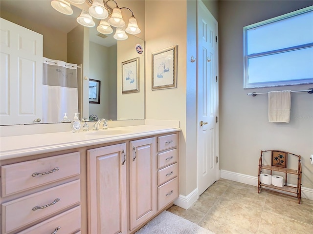 bathroom with vanity and walk in shower