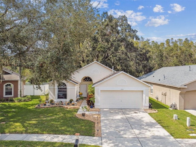 single story home featuring a garage and a front yard