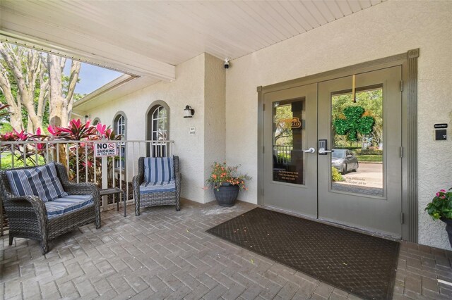 doorway to property with french doors