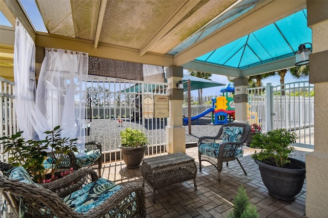 view of patio featuring a playground