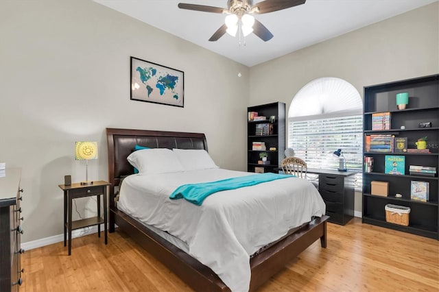 bedroom featuring light wood-type flooring and ceiling fan