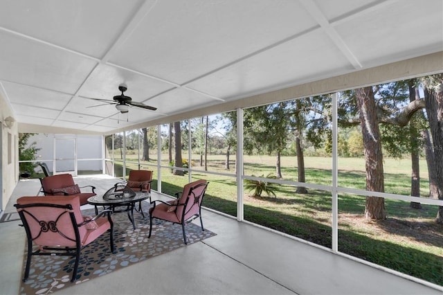 sunroom with ceiling fan and plenty of natural light