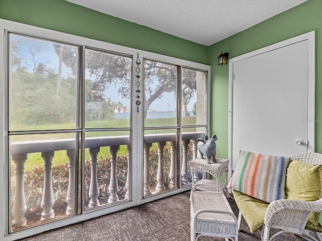 sunroom / solarium featuring plenty of natural light